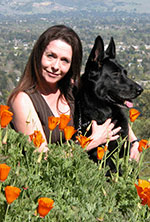 Laura with her black lab Andy.